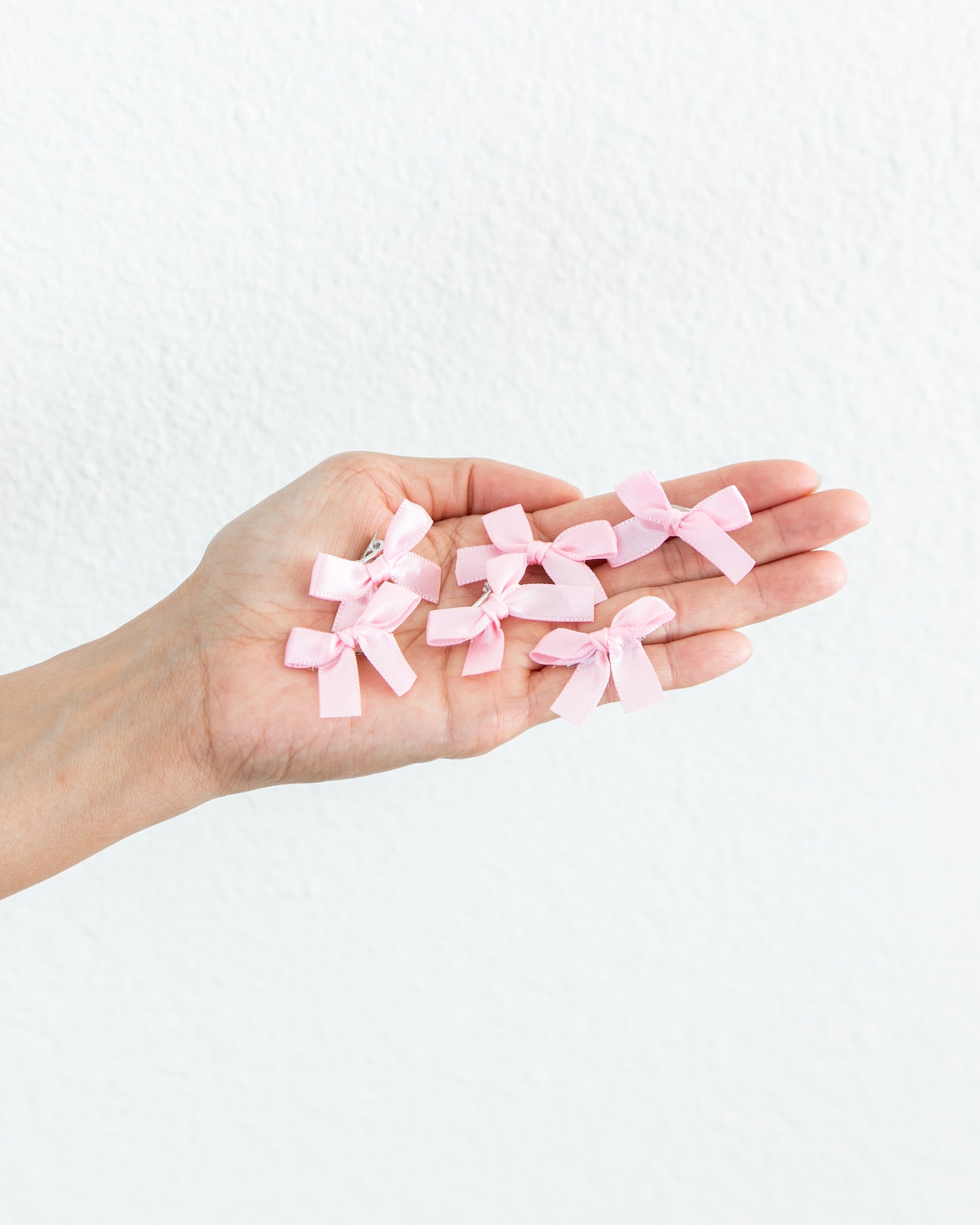 CHRISTINE GARCIA 6-Piece Mini Bow Clips in Light Pink